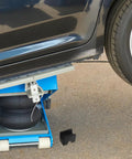 Jack Pad Cover Kit For Car Jacks, Rubber Cushions Protect Pinch Welds And Frame Rails When Lifting, shown installed under a car