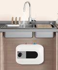 Slick Electric Mini-Tank Water Heater with Totally Sick Instant Hot Water on Tap for a Badass Under Sink Flex in Any Kitchen or Bathroom Setup Featuring 1.5 KW Power and 1.6 Gallon Capacity for Total Space Saving Convenience installed below a kitchen sink.
