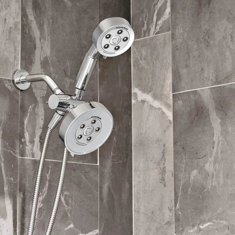 Dual Shower Head With Six Spray Modes, Polished Chrome, 2.5 GPM Water Saving Flow mounted on a tiled wall.