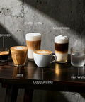 Total Game Changer Automatic Espresso Machine With Built In Grinder 20 Bar Coffee Maker Milk Frother Steam Wand Auto Self Cleaning Barista Style Cappuccino Brew Setup For Home displaying various coffee drinks on dark wood table.