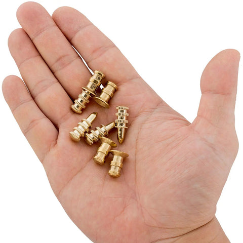 Heavy Duty Table Leaf Connectors And Bolt Sleeves For Extension Dining Tables Rock Solid Zinc Alloy Hardware With Brass Plated Finish, shown in hand.