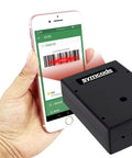Hand holding phone displaying barcode, scanned by Embedded Mini Barcode Scanner For Screen Scanning CCD Reader Module