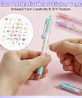 Hands holding DIY Gel Pens With Cute Stickers Six Pack 0.7mm Black Ink Smooth Writing Quick Dry Journaling Pens for note-taking