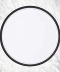 Top view of huge 16 inch lazy susan turntable with soft non slip lip and deep ledge on marble surface