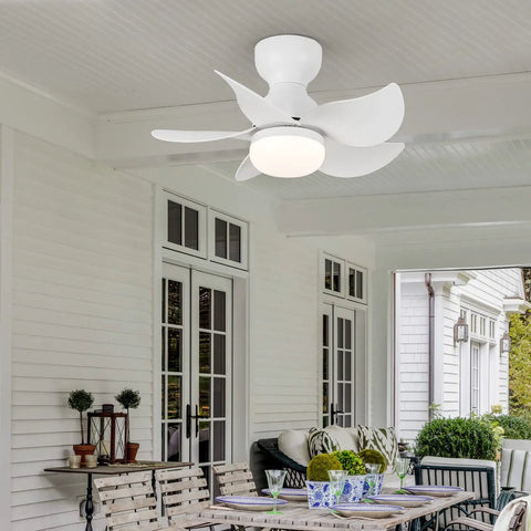 Dope 24 Inch Flush Mount Ceiling Fan With Light Kit in an outdoor patio setting, featuring 5 blades and a white finish