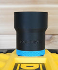Top Shelf Dust Collection Hose Adapter Fits DW735 Series Planers, black vacuum hose adapter on yellow surface.