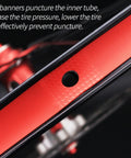 Close-up of heavy duty rim tape strip liner for mountain bike, 26 inch red, nylon construction, showing spoke hole protection.