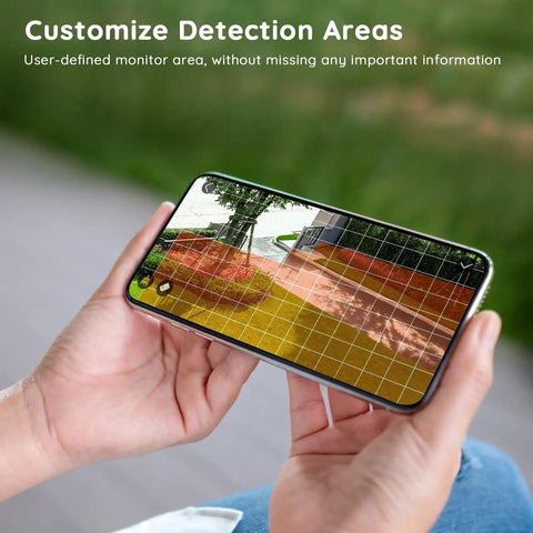Person holding smartphone with app interface for 2K Ultra Clear Solar Wireless Outdoor Security Camera With 360 Degree PTZ, Spotlight And Siren