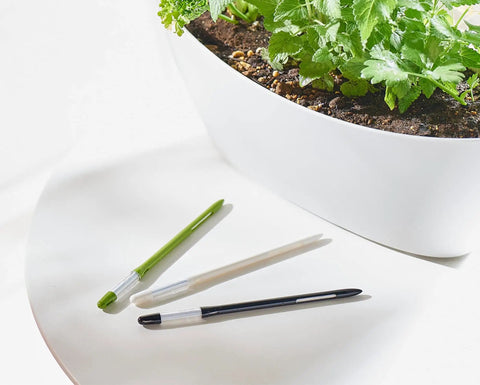 Large Black Leave In Soil Moisture Meter For Potted Plants Refillable Plant Water Sensor Continuous In Soil Monitoring 2 Pack Bundle For 6 To 12 Inch Pots Easy Read Indicators No Guesswork, three plant moisture meters beside potted herbs