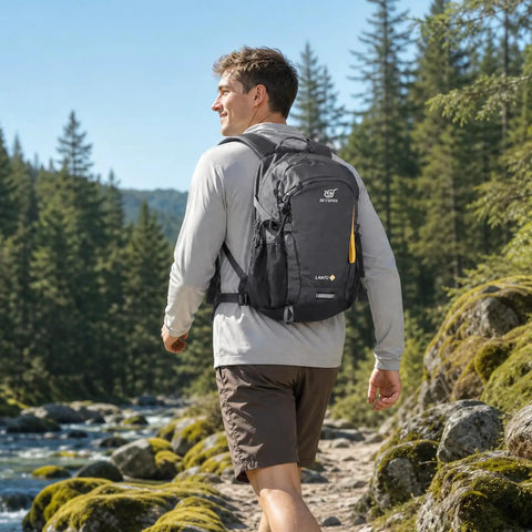 Man wearing 20L Lightweight Hiking Backpack for Men and Women, Daypack for Travel and Outdoor Adventures in forest