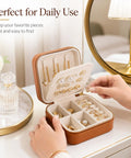 Super Chic Travel Jewelry Box With Waterproof PU Leather Exterior And Soft Flannel Interior Removable Dividers, open view with jewelry.