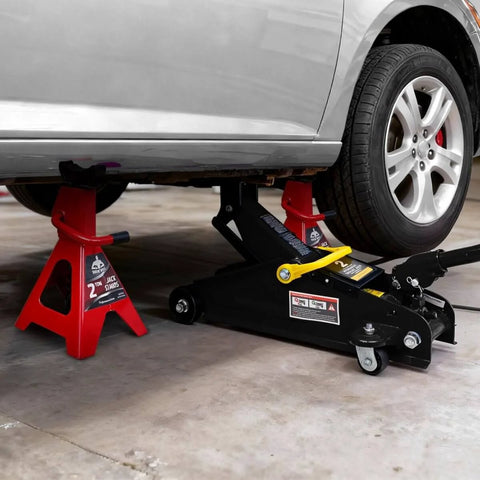 Car lifted by 2 Ton Hydraulic Floor Jack With Two Jack Stands Red And Black 4000 Lbs Capacity Trolley Service Jack Combo