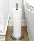 Freestanding Brushed Stainless Steel Toilet Paper Holder With Rock Solid Heavy Base Holds Three Rolls Anti Tip Bathroom Storage Stand next to toilet
