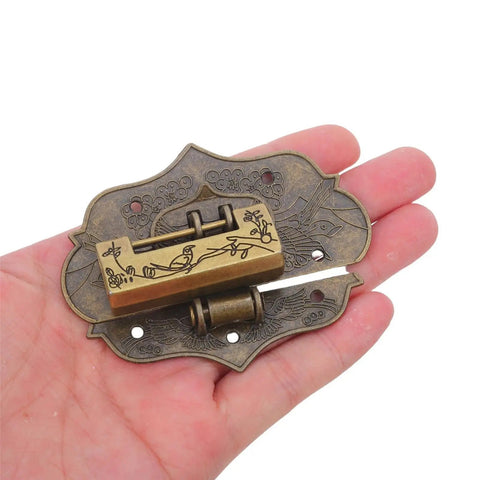 Vintage Zinc Alloy Padlock with key and screws for wooden cases and jewelry boxes, retro hasp lock in hand for DIY projects.