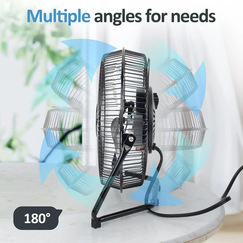 Side view of Three Speed Portable Metal Floor Fan With Adjustable Tilt For Home Office And Bedroom Quiet Operation Lightweight Yet Sturdy Black Nine Inch Chill Breeze For Desk Or Floor Use on a table demonstrating 180° tilt capability.