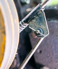 Close-up of Garage Ready 555 Piece Cotter Pin and Hairpin Fastener Kit securing metal equipment with durable spring steel pin.