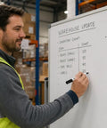 Person using a 40 Count Black Dry Erase Markers With Low Odor Ink And Chisel Tip For Classrooms And Offices on whiteboard.