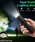 Person using Six Pack Rechargeable LED Flashlights With High Lumen Output at night, showing brightness and 3 lighting modes.