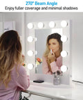 Woman applying lipstick in front of illuminated vanity mirror with 12 Pack G25 LED Vanity Bulbs 450 Lumens 5W Equal 40W Dimmable