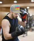 Man boxing indoors wearing Apricot Mesh Baseball Hat For Men And Women Cool Bugs Trucker Cap Breathable Athletic Style Cap