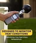 Person holding Pro Grade Heat Index Monitor With Wet Bulb Globe Temperature Gauge And Brass Ball outdoors
