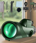 80x100 High Powered Monocular Telescope With Smartphone Adapter for Adults and accessories on a wooden surface