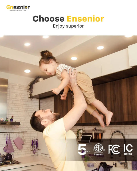 Father lifting child in family kitchen with warm lighting from 36 Pack 6 Inch Led Recessed Lights Canless Wafer Downlight.