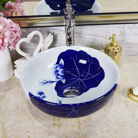 Round Hand Painted Ceramic Vessel Sink Above Counter Bathroom Basin With Slick Classic Vintage Vibes For Quick Room Glow Up And Top Tier Durable Vanity Setup, featuring blue floral design.