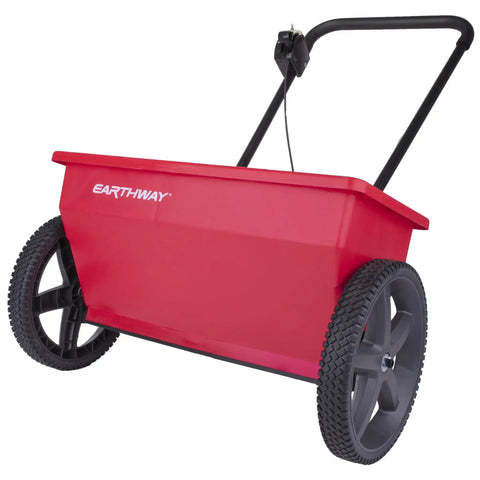 Red 75Lb Drop Spreader for Lawn Care With 22 Inch Coverage, adjustable flow, sturdy design, large wheels, side view