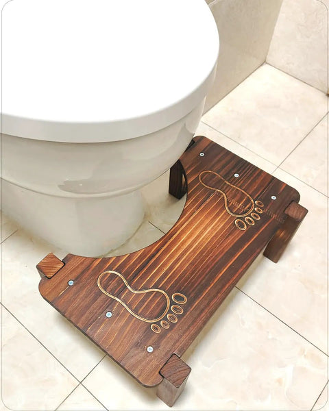 7 Inch Squatting Toilet Stool For Adults With Foot Pad And Anti Slip Design Built For Comfort And Safety next to a white toilet