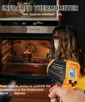 Infrared Thermometer Laser Temp Gun With Calibration pointed at oven, 192°F reading, showing use for cooking