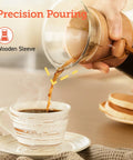 Pour Over Coffee Maker With Double Layer Stainless Steel Filter For Rich, Smooth Flavor, 8 Cup 34oz Drip Brewer with coffee pouring into cup.