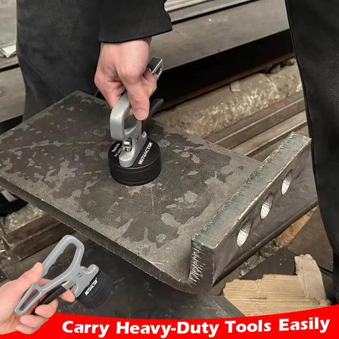 Front view of MUTUACTOR grey magnetic pickup tool with release handle lifting a thick iron plate.