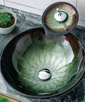 Slick Tempered Glass Bathroom Vessel Sink With Hardcore Waterfall Faucet Premium Countertop Wash Basin on marble countertop.