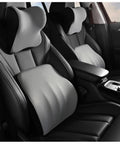 Upgrade Your Mini John Cooper Works Electric For 2025 And 2026 With This Super Comfy Headrest And Lumbar Support Cushion Set featuring grey covers.
