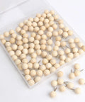 Top Shelf Wooden Push Pins, 120 Pack Of Straightforward Thumb Tacks For Corkboards And Bulletin Boards in a clear box.