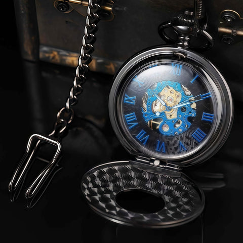 Skeleton Pocket Watch With Mechanical Movement And Double Cover Roman Numeral Dial Standable Half Hunter Photo Insert Vintage Smart Style For Men And Women Box And Chain Included displayed open with blue dial and chain