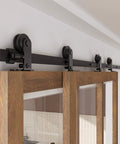 Heavy Duty 4Ft Bypass Sliding Barn Door Hardware Kit Built Tough For Two Doors Single Track System With Smooth Quiet Glide Top Mount Hangers Rust Resistant Black Steel Rail Ideal For Farmhouse Or Modern Living Spaces Door Not Included installed view