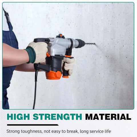 Rotary hammer drill in use drilling concrete; gray and orange body with gloved hands gripping the tool