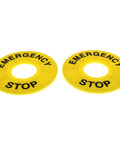 Yellow emergency stop labels for push button switches, used in industrial control panels and safety systems.