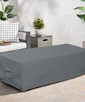 Rectangular Fire Pit Cover 48 Inch Long 25 Inch Wide 18 Inch High Heavy Duty Tough As Nails Waterproof shown on patio