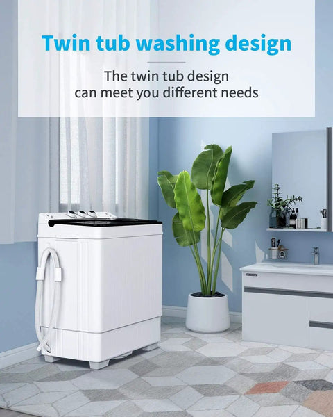 Slick Compact Twin Tub Portable Mini Washing Machine With Built In Drain Pump in a modern laundry space with plants.