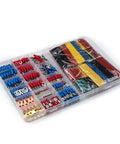 Heavy Duty 678 Piece Crimping Tool Kit With Assorted Cold Press Terminals And Heat Shrink Tubing For Electrical Wiring Projects, organized in a clear container.