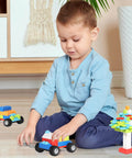 Child playing with Mega 1500 Piece Building Bricks Set For Kids With Doors, Windows, Wheels And Axles Includes 24 Big Wheels And 6 Doors