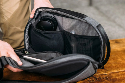 Lightweight 6L Crossbody Sling Bag For Travel And Everyday Carry, Anti Theft Pocket System open showing compartments.