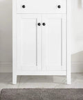 Front view of Nantucket 24 Inch Bathroom Vanity Cabinet in White with dual soft-close doors, solid wood build, perfect for small bathrooms