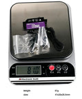 Beefy 25KG High Torque Steering Servo With Coreless Motor And Steel Gears 7.4V HV IP67 on electronic scale showing 81g