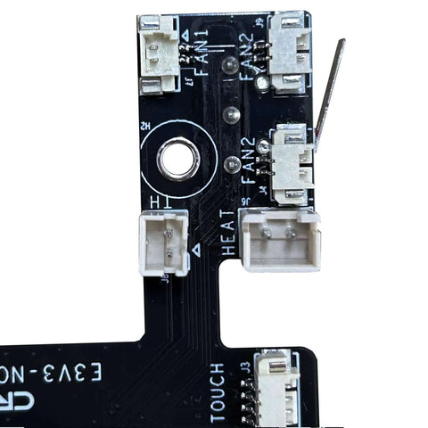 Close-up of Ender 3 V3 KE Hotend Adapter Plate With E3V3 Nozzle V1.6 PCBA Breakout Module, showing circuit connections.