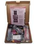 Open box with DS-7208HUHI-F2/N Digital Video Recorder 8 Channel for HD-TVI and Analog Cameras, cables, remote, and manual