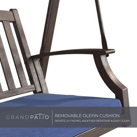 Close-up of wooden armrest and removable dark blue cushion on Two Seat Patio Swing With Adjustable Tilt Canopy Outdoor Porch Swing Farmhouse Style With Removable Cushions Dark Blue Smooth Gentle Motion From Heavy Duty Springs And Reinforced Bottom For Cozy Outdoor Chill.